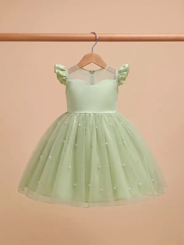 Robe verte — 5 ans · Bébé et enfant, dressing du studio de Julie Dugardin Photographe