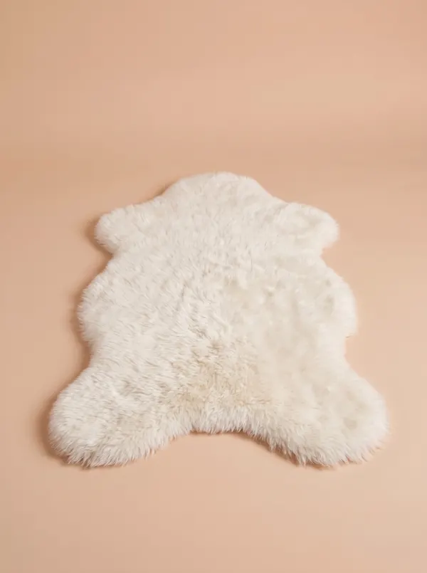 Tapis blanc 3 · Décors et accessoires, dressing du studio de Julie Dugardin Photographe